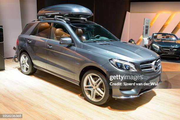 Mercedes-Benz GLE-Class GLE 500 e 4MATIC plug-in hybrid luxury SUV with a skibox mounted on the roof on display at Brussels Expo on January 13, 2017...