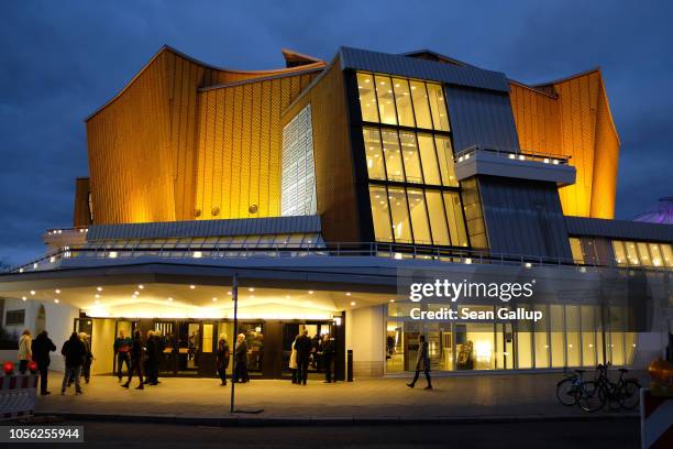 The Berliner Philharmonie concert hall stands at twilight on October 27, 2018 in Berlin, Germany. The building was designed by German architect Hans...