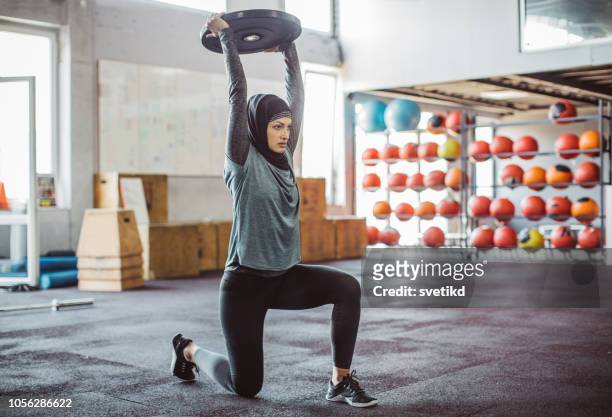 motivated for success - women working out gym stock pictures, royalty-free photos & images