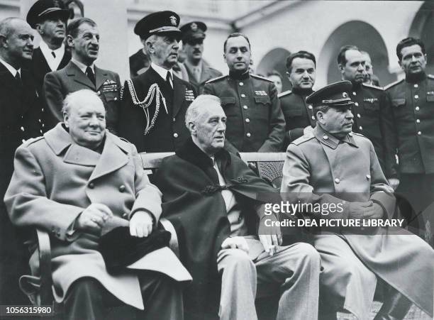 Winston Churchill, Franklin Delano Roosevelt and Joseph Stalin in the courtyard of Livadija Palace, Yalta Conference, February 4-12 Crimea, World War...