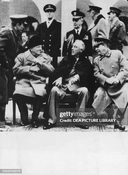 Winston Churchill, Franklin Delano Roosevelt and Joseph Stalin in the courtyard of Livadija Palace, Yalta Conference, February 4-12 Crimea, World War...