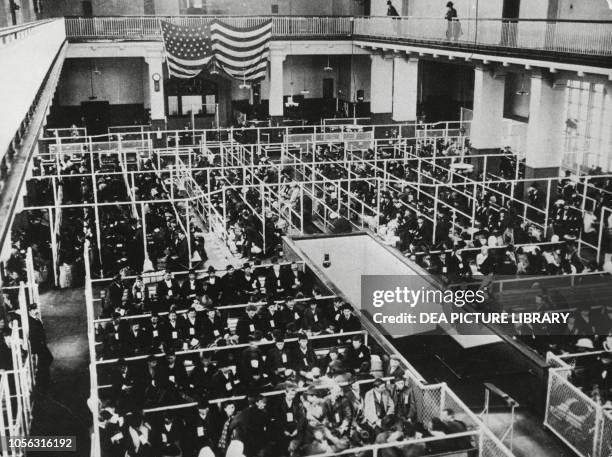 Emigrants awaiting medical examinations Ellis Island, New York, United States of America, 20th century.