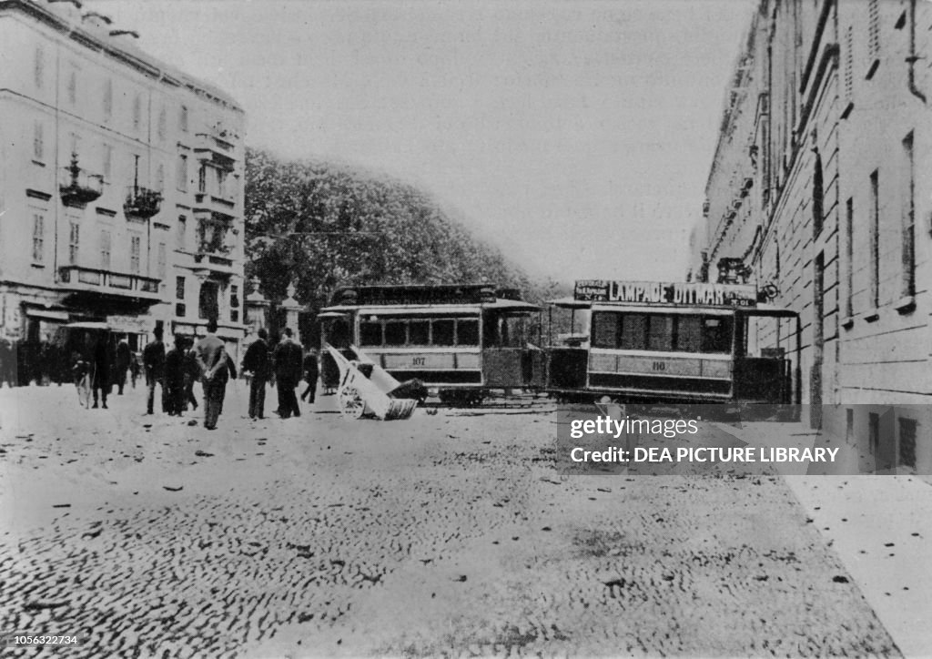 Barricade made with tram cars in Corso Venezia
