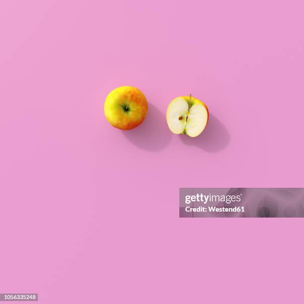 3d rendering, halved apple on pink background - two apples stock illustrations