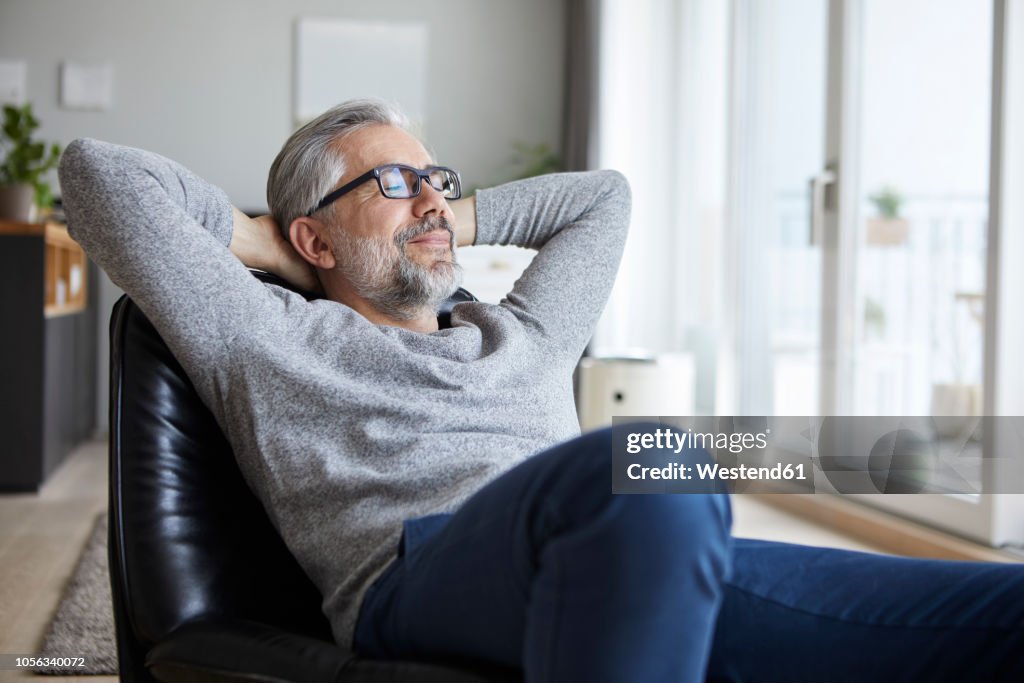 Portrait of mature man relaxing at home