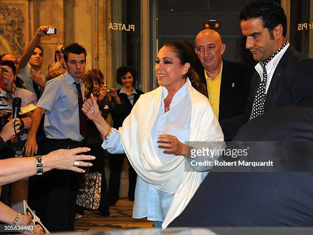 Isabel Pantoja greets her supporters after finishing a performance of her 'Asi es la vida' show at the Theater Coliseum on October 15, 2010 in...