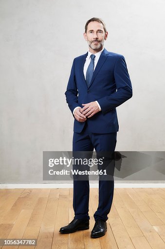 Businessman wearing dark blue suit Businessman wearing dark blue suit