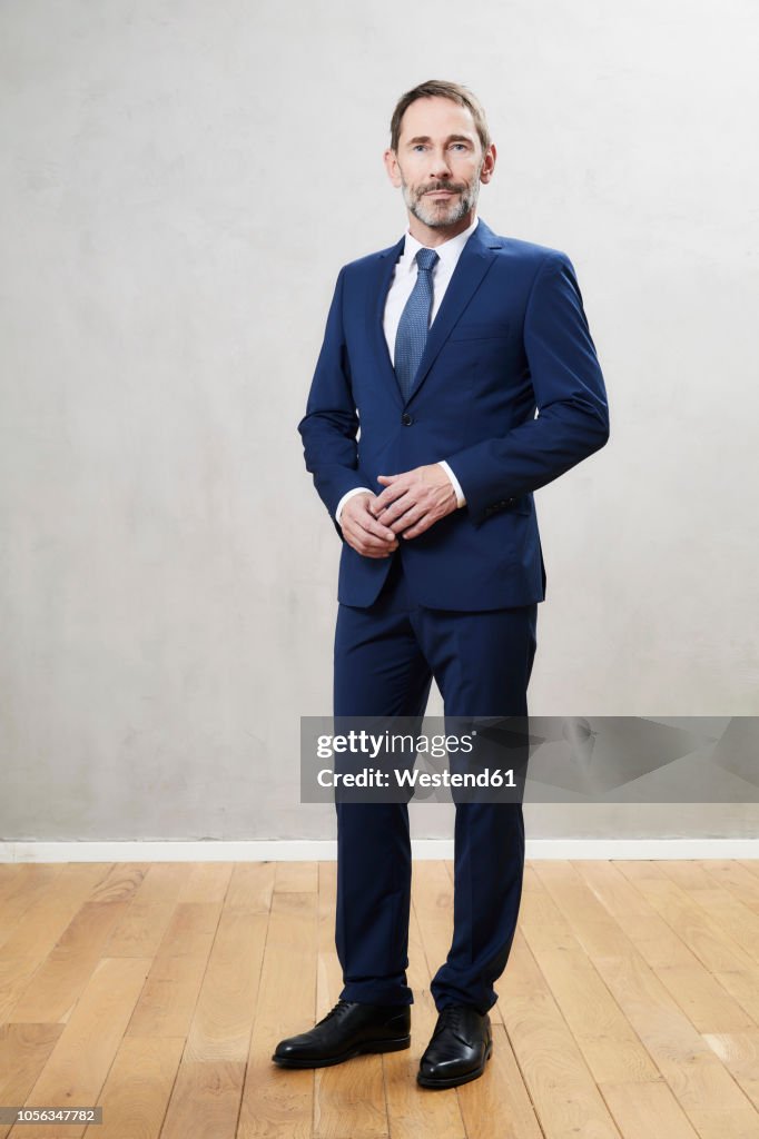 Businessman wearing dark blue suit