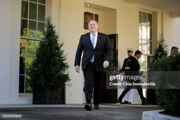 Secretary of State Mike Pompeo talks to journalists following a meeting with President Donald Trump at the White House October 18, 2018 in...