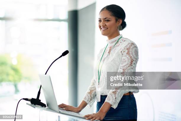 i'm looking forward to sharing the information with you all - speaker podium stock pictures, royalty-free photos & images