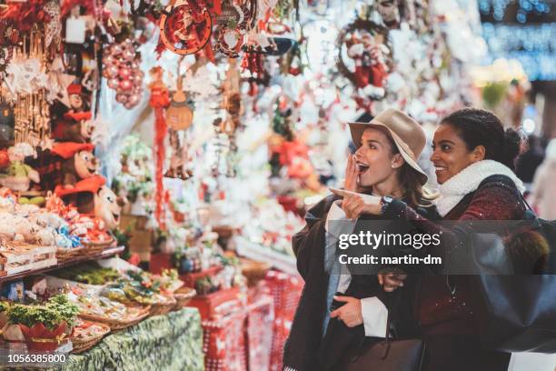 friends shopping christmas presents - barcelona shopping stock pictures, royalty-free photos & images