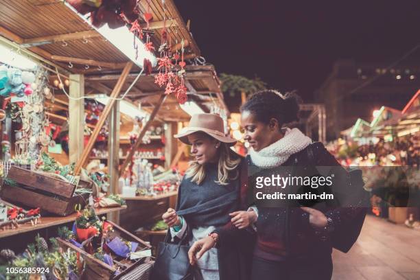 friends shopping christmas presents - barcelona shopping stock pictures, royalty-free photos & images