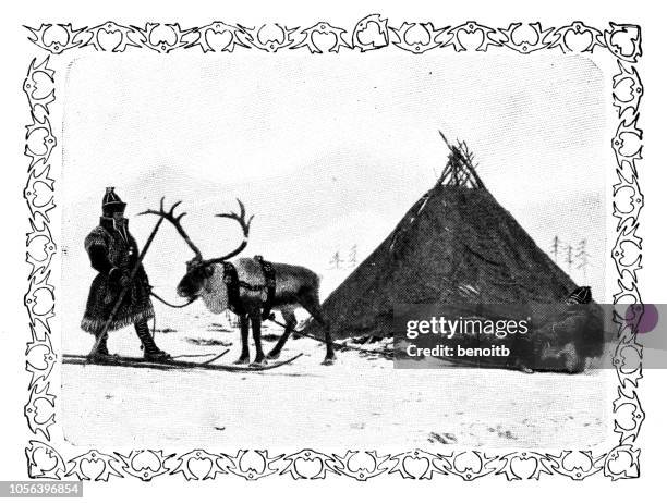 man with reindeer by tent - finland winter stock illustrations