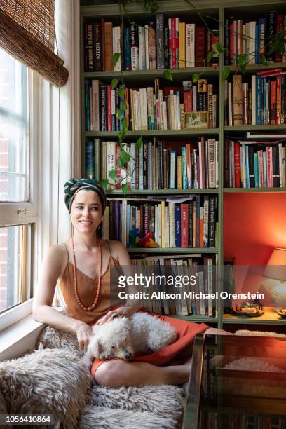 Actress Parker Posey is photographed for Wall Street Journal on June 28, 2018 at home with her bichon frise-poodle-Maltese mix Gracie, in New York...