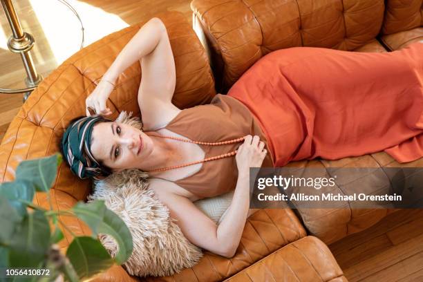 Actress Parker Posey is photographed for Wall Street Journal on June 28, 2018 at home with her bichon frise-poodle-Maltese mix Gracie, in New York...