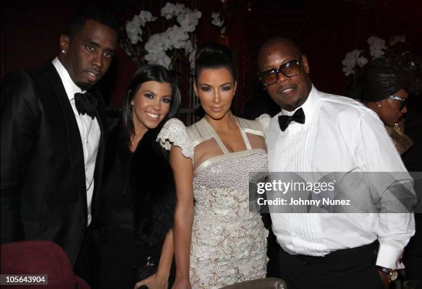 Sean "Diddy" Combs, Kourtney Kardashian, Kim Kardashian and Andre Harrell attend Andre Harrell's 50th birthday party at The Darby restaurant on...