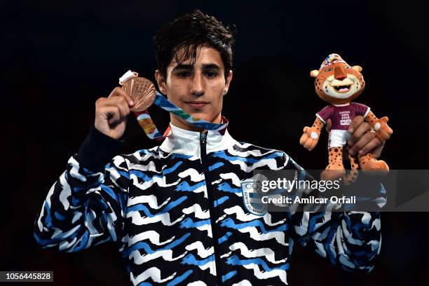 Mirco Jehiel Cuello of Argentina in the podium of Men's Bantam Bronze Medal Bout during day 12 of Buenos Aires 2018 Youth Olympic Games at Oceania...