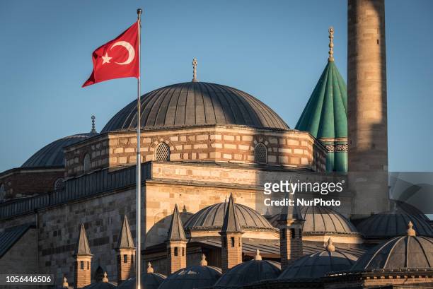 On 27 Oct. 2018, a Turkish flag waves in the wind in front of the Mevlana Museum, the mausoleum of the Persian Sufi mystic Jalal ad-Din Muhammad...
