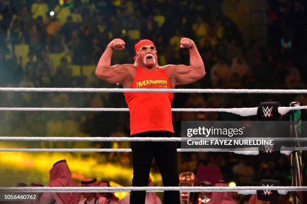 Wrestling legend Hulk Hogan greets the crowd during the World Wrestling Entertainment Crown Jewel pay-per-view at the King Saud University Stadium in...