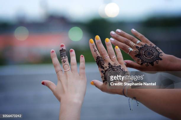 friends hands - henna tattoo stock pictures, royalty-free photos & images