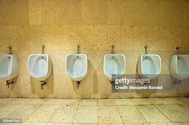 urinals - public restroom stock-fotos und bilder