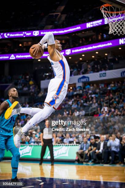 Russell Westbrook of the Oklahoma City Thunder dunks the ball against the Charlotte Hornets on November 1, 2018 at Spectrum Center in Charlotte,...