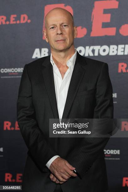 Actor Bruce Willis attends a photocall to present the movie "R.E.D." at the Regent Hotel on October 18, 2010 in Berlin, Germany.