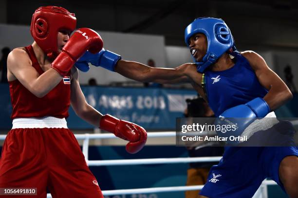 Caroline Sara Dubois of Great Britain beats Porntip Buapa of Thailand in Women's Light during day 12 of Buenos Aires 2018 Youth Olympic Games at...