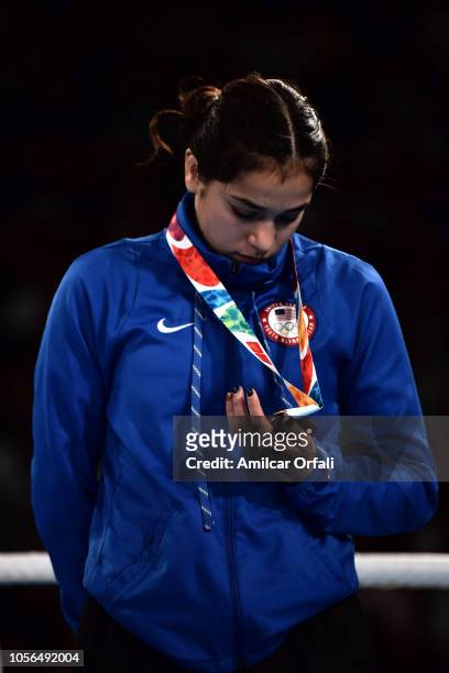 Heaven Destiny Garcia of United States looks her bronze medal in the podium of Women's Fly during day 12 of Buenos Aires 2018 Youth Olympic Games at...