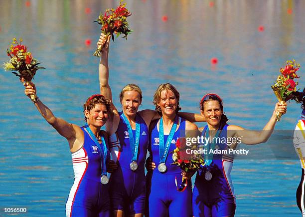 The Great Britain crew of Guin Batten, Gillian Lindsay, Katherine Grainger and Miriam Batten celebrate silver in the Womens Quadruple Rowing Sculls...