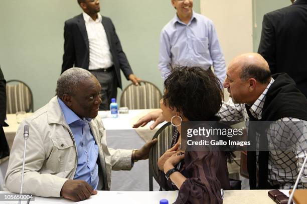 South Africa's Intelligence minister Siyabonga Cwele, Defense minister Lindiwe Sisulu and Minister Trevor Manuel share views during the government's...
