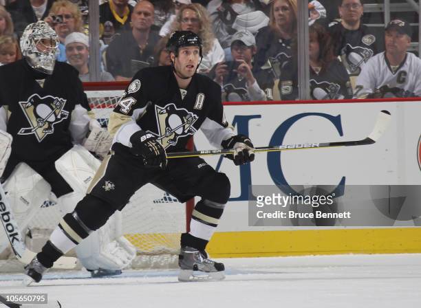 Brooks Orpik of the Pittsburgh Penguins skates against the Philadelphia Flyers at the Consol Energy Center on October 7, 2010 in Pittsburgh,...