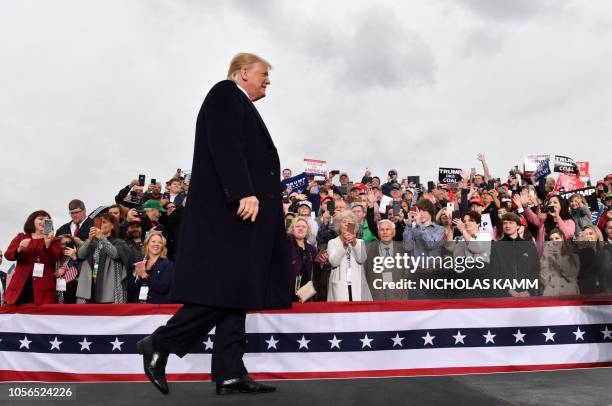 President Donald Trump arrives to speak at a campaign rally at the Huntington Tri-State Airport, on November 2 in Huntington, West Virginia.