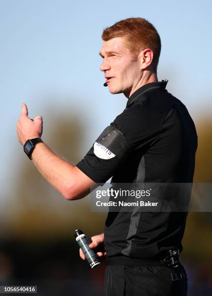 Match Referee, James Oldham in action during the Premier League 2 match between Tottenham Hotspur and Swansea City at Tottenham Hotspur Training...