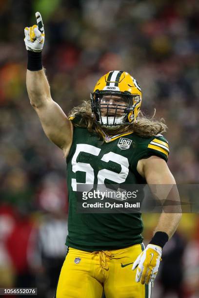 Clay Matthews of the Green Bay Packers celebrates after recording a sack in the fourth quarter against the San Francisco 49ers at Lambeau Field on...