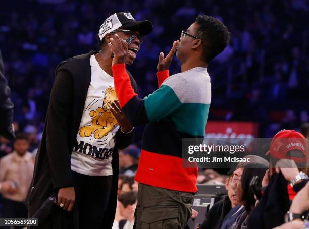 Saturday Night Live' cast member Leslie Jones and comedian Chris Rock attend a game between the New York Knicks and the Golden State Warriors at...