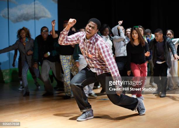 teenagers rehearsing on stage - actor stock pictures, royalty-free photos & images
