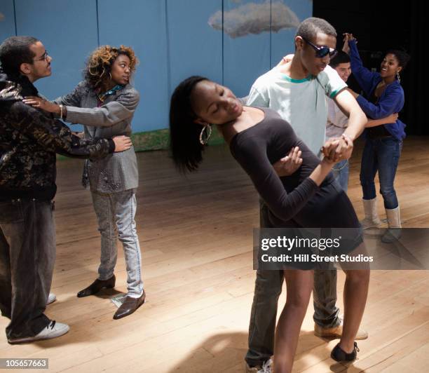 teenagers rehearsing on stage - high school dance stock pictures, royalty-free photos & images