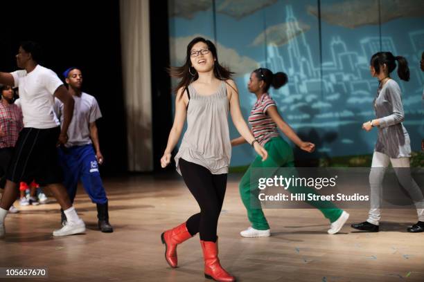 teenagers rehearsing on stage - korean teen fotografías e imágenes de stock