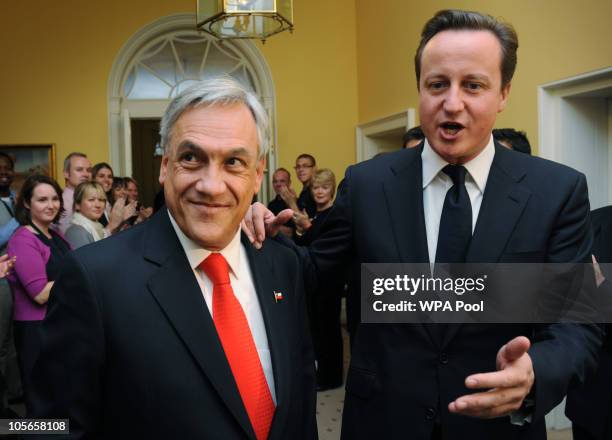 Chile's President Sebastian Pinera is greeted by PM David Cameron at 10 Downing Street on October 18, 2010 in London. Pinera is presenting Britain's...