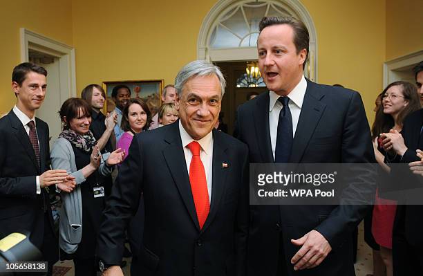 Chile's President Sebastian Pinera is greeted by PM David Cameron at 10 Downing Street on October 18, 2010 in London. Pinera is presenting Britain's...