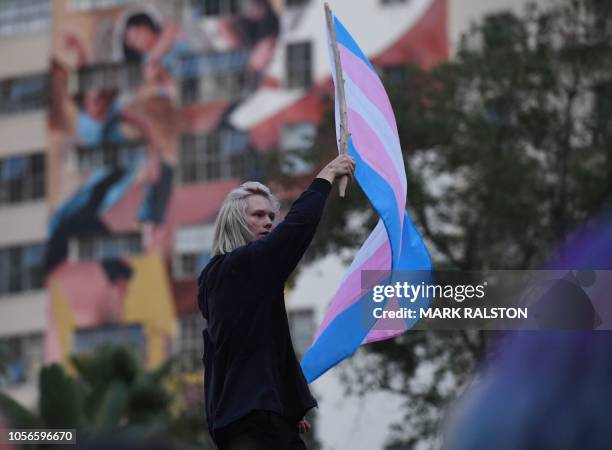 Members of the Transgender community and their supporters hold a rally and march to City Hall before the mid-term elections to protest against what...