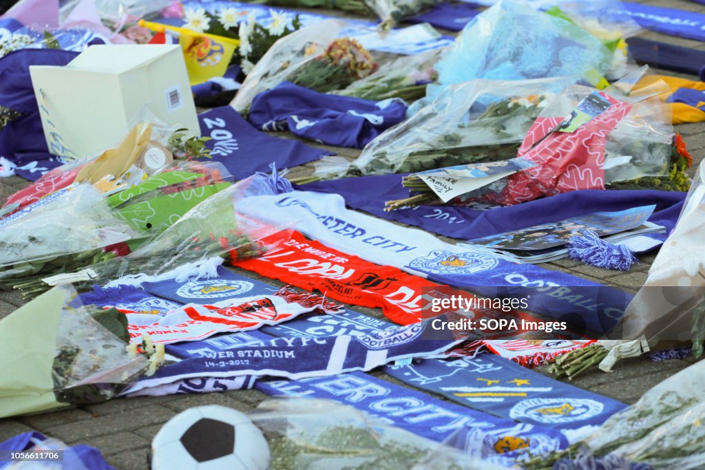 Flowers and club scurf's are seen lying on the ground during...