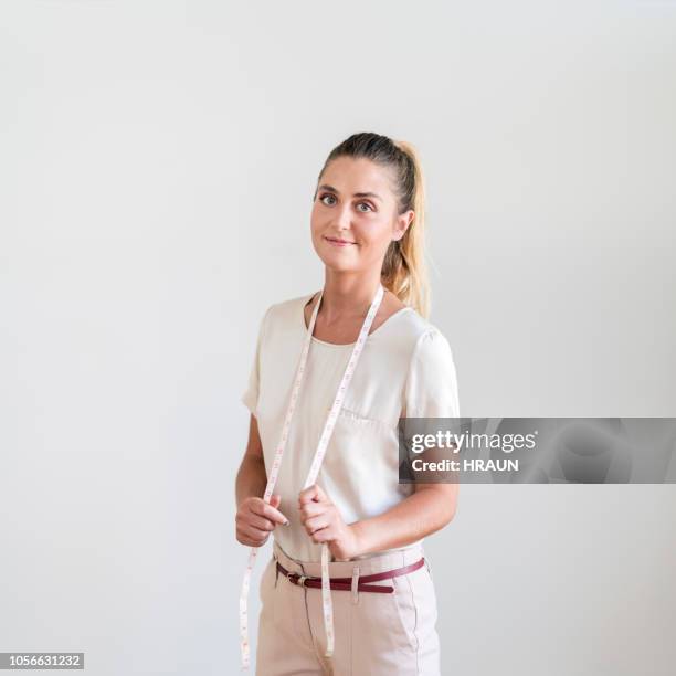 portrait of confident female design professional - woman tailor stock pictures, royalty-free photos & images