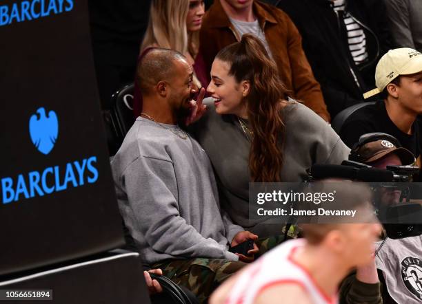 Ashley Graham and Justin Ervin attend the Houston Rockets vs Brooklyn Nets game at Barclays Center of Brooklyn on November 2, 2018 in New York City.