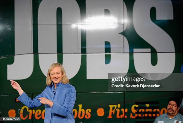 Republican gubernatorial candidate and former eBay CEO Meg Whitman speaks standing in front of her campaign touring bus at Earth Friendly Products...