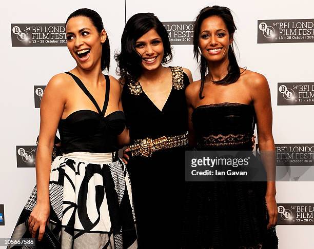 Actress Yasmine Elmasri, actress Freida Pinto and writer Rula Jebreal attend the "Miral" premiere during the 54th BFI London Film Festival at the Vue...
