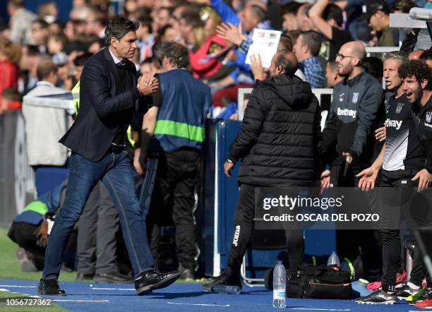 Leganes' Argentinian coach Mauricio Pellegrino celebrates the equalizer during the Spanish league football match between Club Deportivo Leganes SAD...