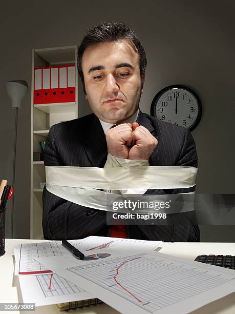 hands bound businessman - needs improvement stock pictures, royalty-free photos & images
