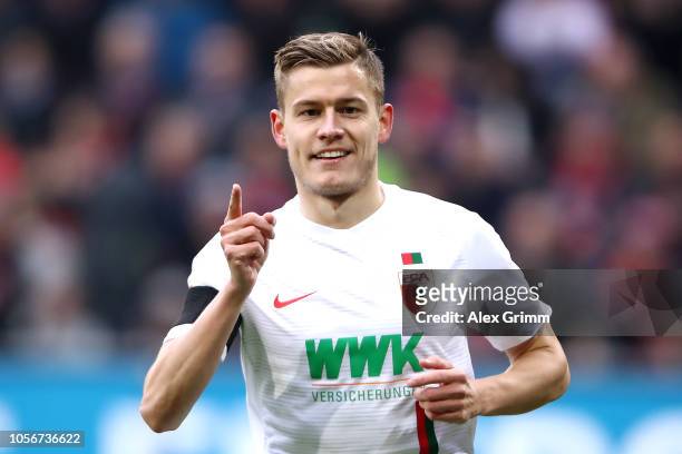 Alfred Finnbogason of Augsburg celebrates after scoring his team's first goal during the Bundesliga match between FC Augsburg and 1. FC Nuernberg at...